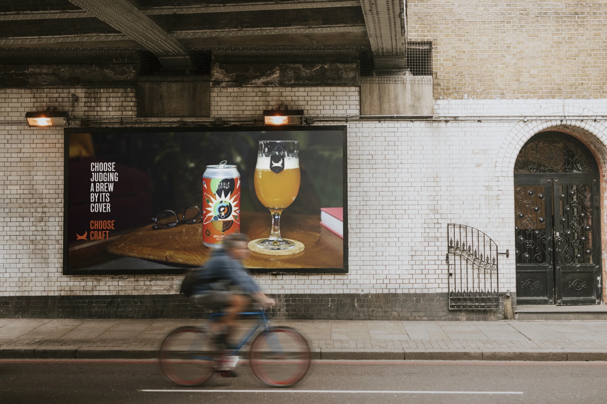 BrewDog Choose Craft billboard showing a craft beer can and glass with the line Choose judging a brew by its cover.