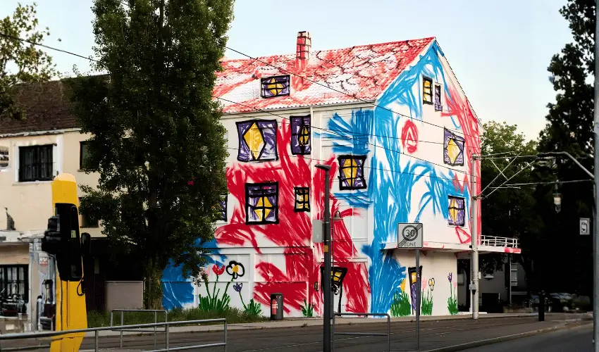 The Wa Turns an Empty Stuttgart Facade Into Childlike Cultural OOH Art