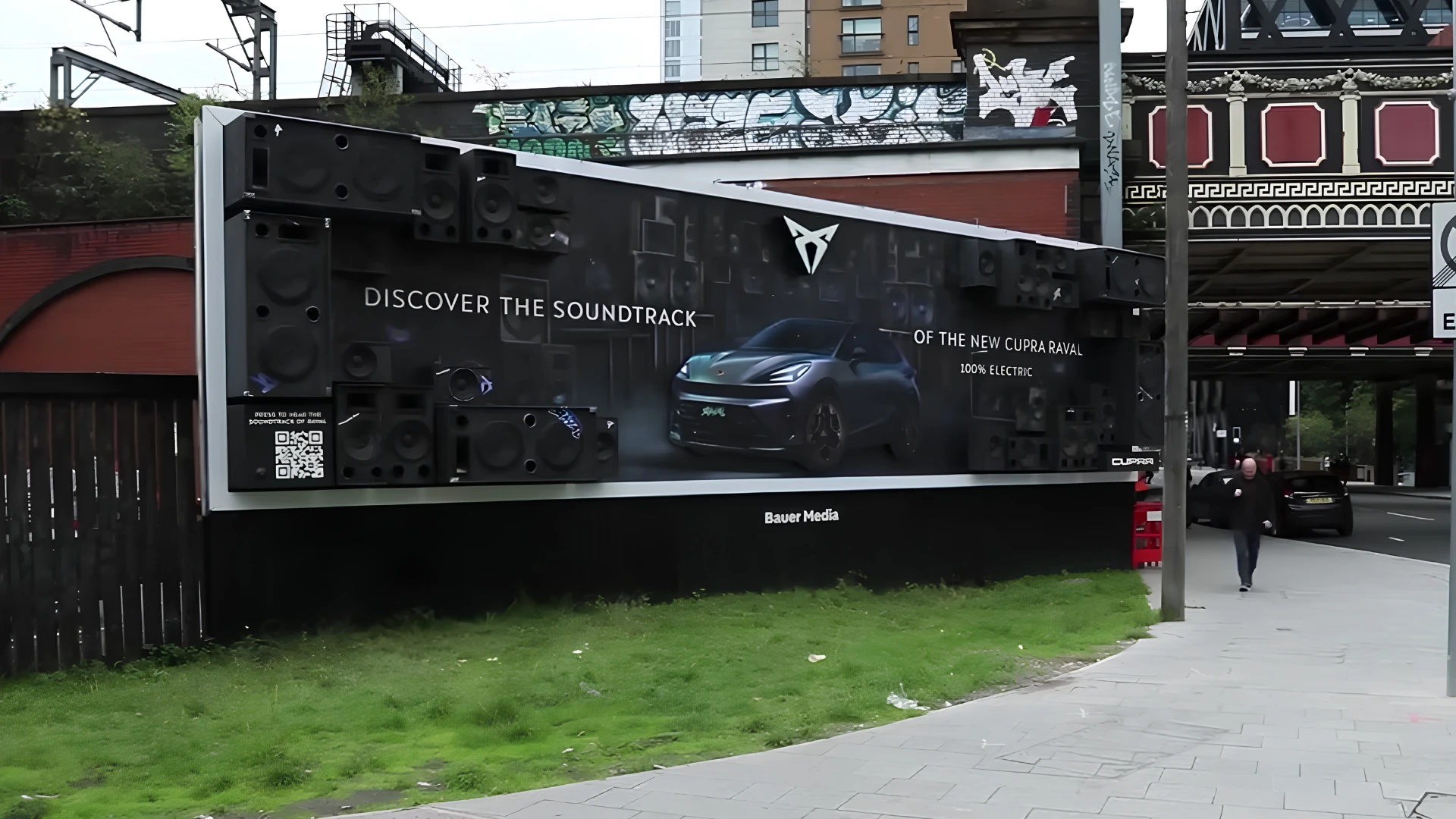 CUPRA Raval interactive billboard built with multiple three-dimensional speaker elements, an electric CUPRA Raval visual and the message Discover the Soundtrack.