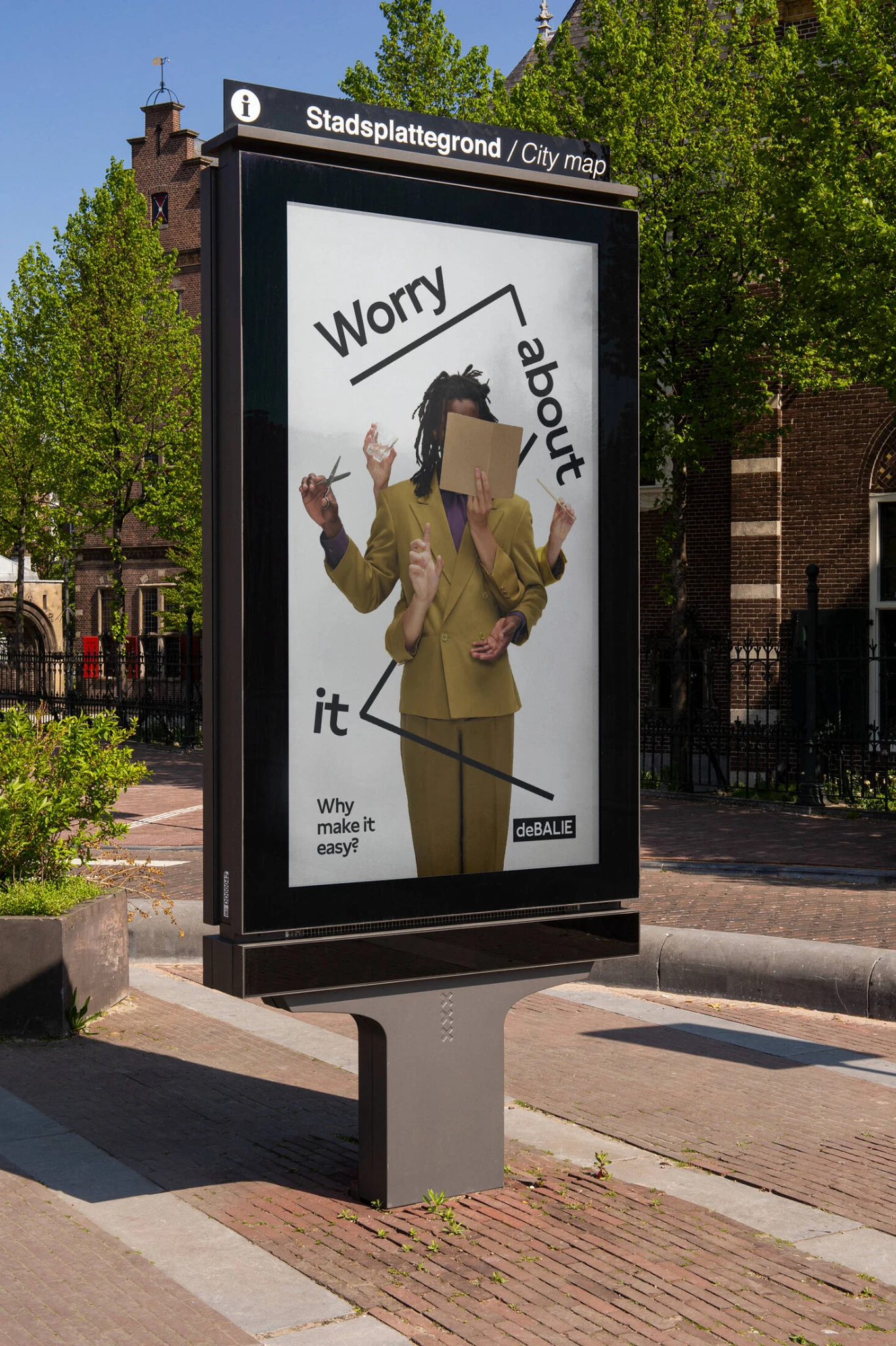 A De Balie Why make it easy city map poster in Amsterdam featuring surreal photography and the line Worry about it.