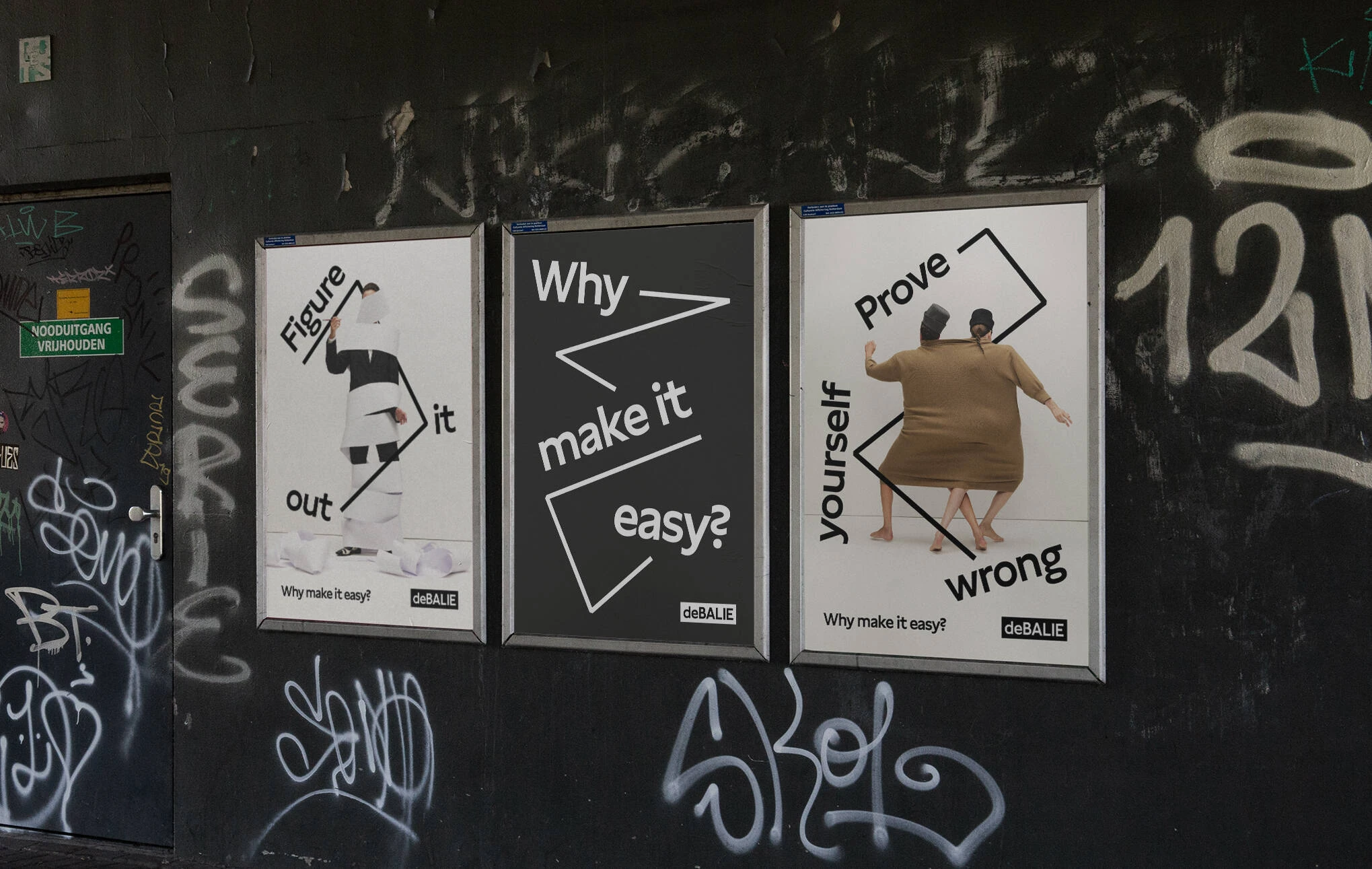 De Balie Why make it easy campaign posters displayed in a tunnel in Amsterdam, combining bold typography, surreal photography and provocative lines such as Figure it out and Prove yourself wrong.