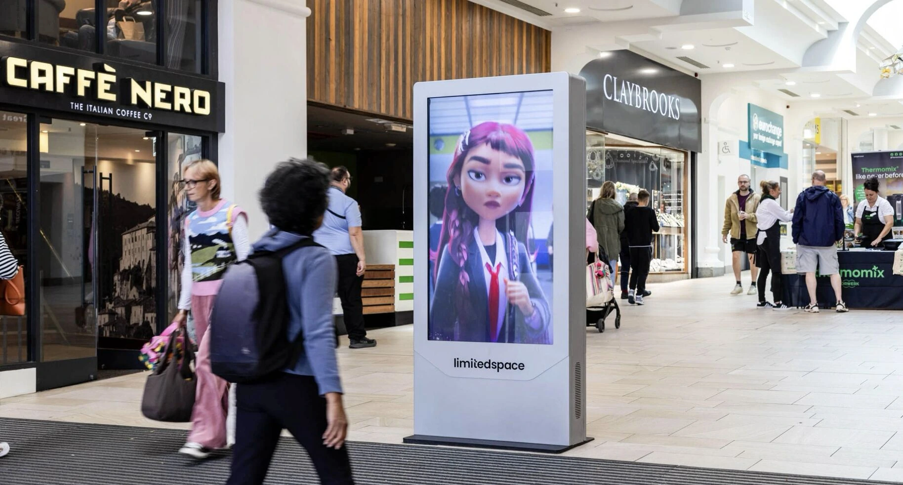 Close-up of a Disney Hexed character shown on a D6 digital screen in a shopping centre corridor.