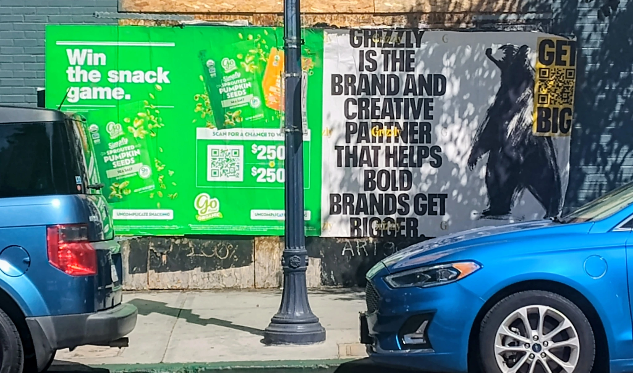 Grizzly poster stating that the agency is a brand and creative partner that helps bold brands get bigger.
