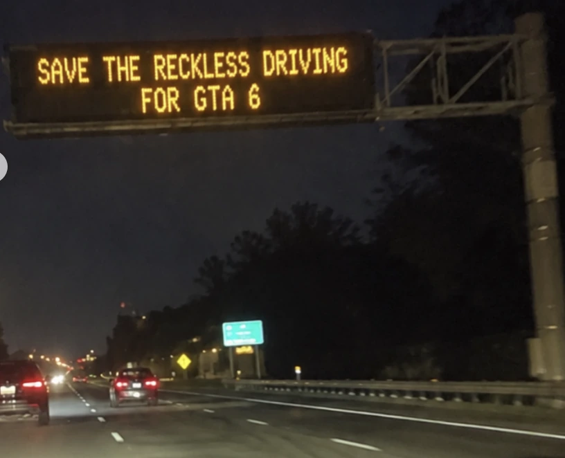 Highway sign that says Save the reckless driving for GTA 6.