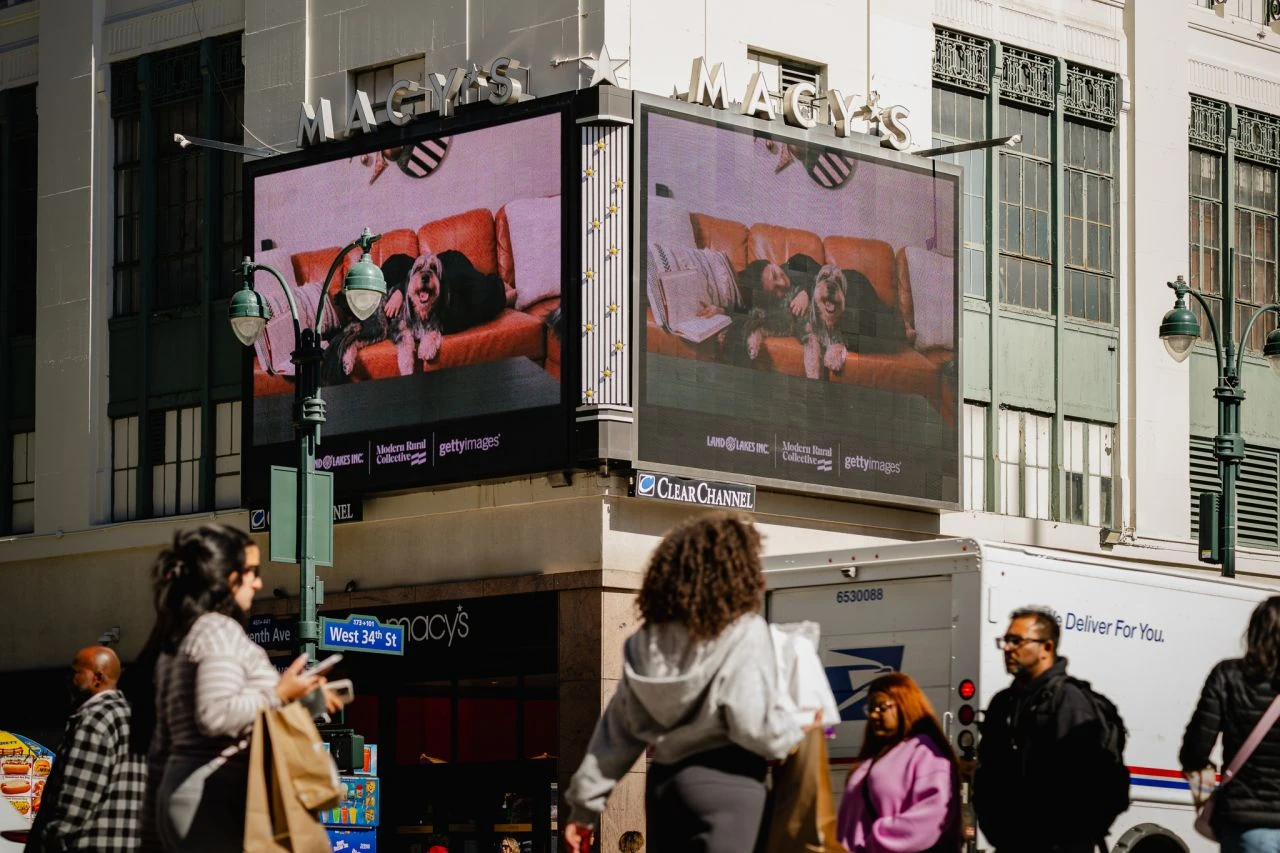 Land O’Lakes Repicturing Rural campaign displayed on digital billboards near Macy’s in New York, featuring contemporary rural photography.