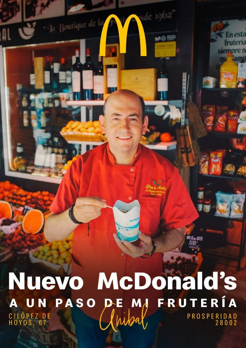 McDonald’s neighborhood campaign creative featuring a local fruit shop owner in Prosperidad, Madrid.