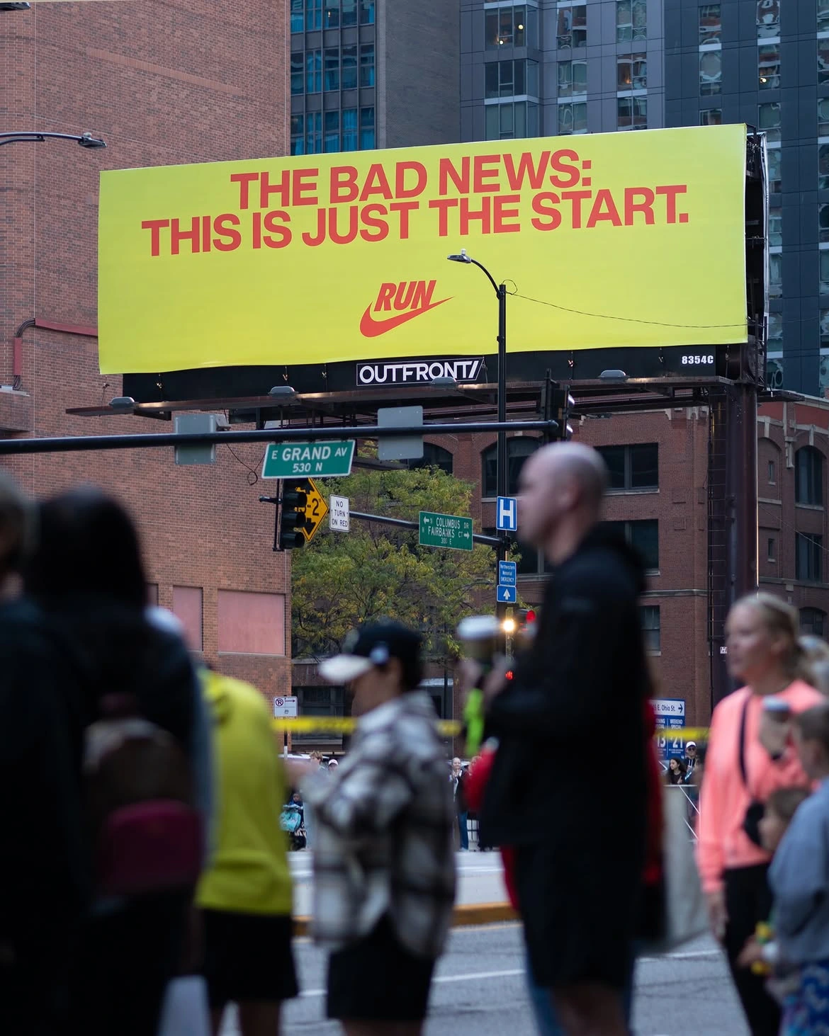 Nike Running billboard at the Chicago Marathon reading The Bad News: This Is Just the Start.