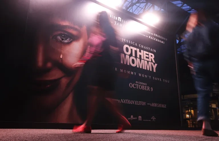 Other Mommy billboard at Spitalfields Market featuring Jessica Chastain with a visible tear running down her face.