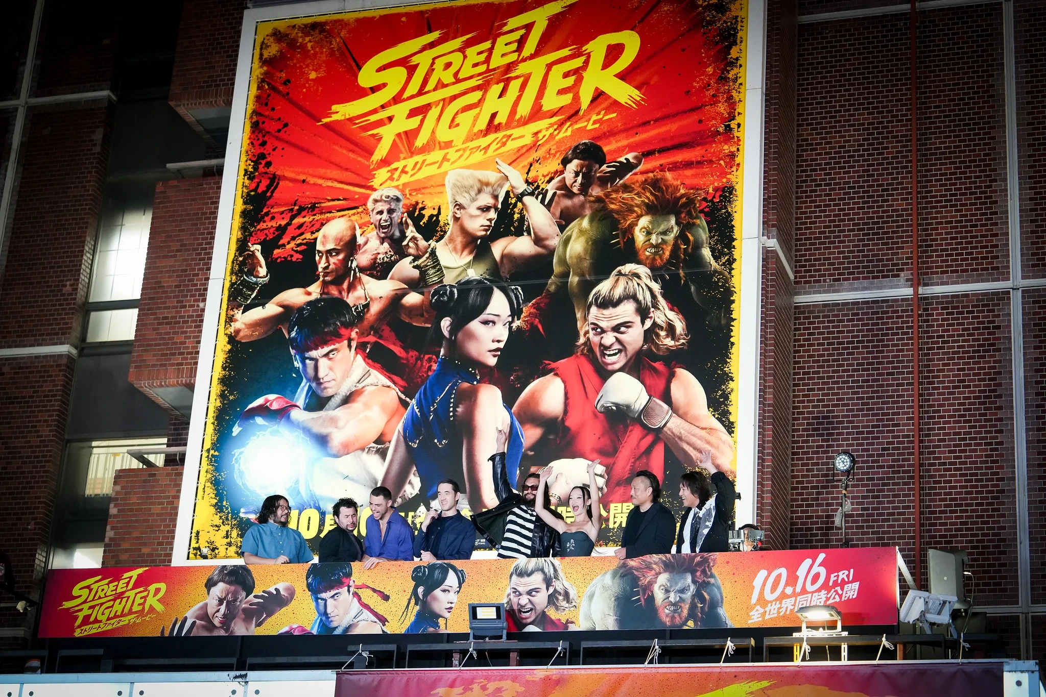 Large-scale Street Fighter billboard activation with giant character imagery.