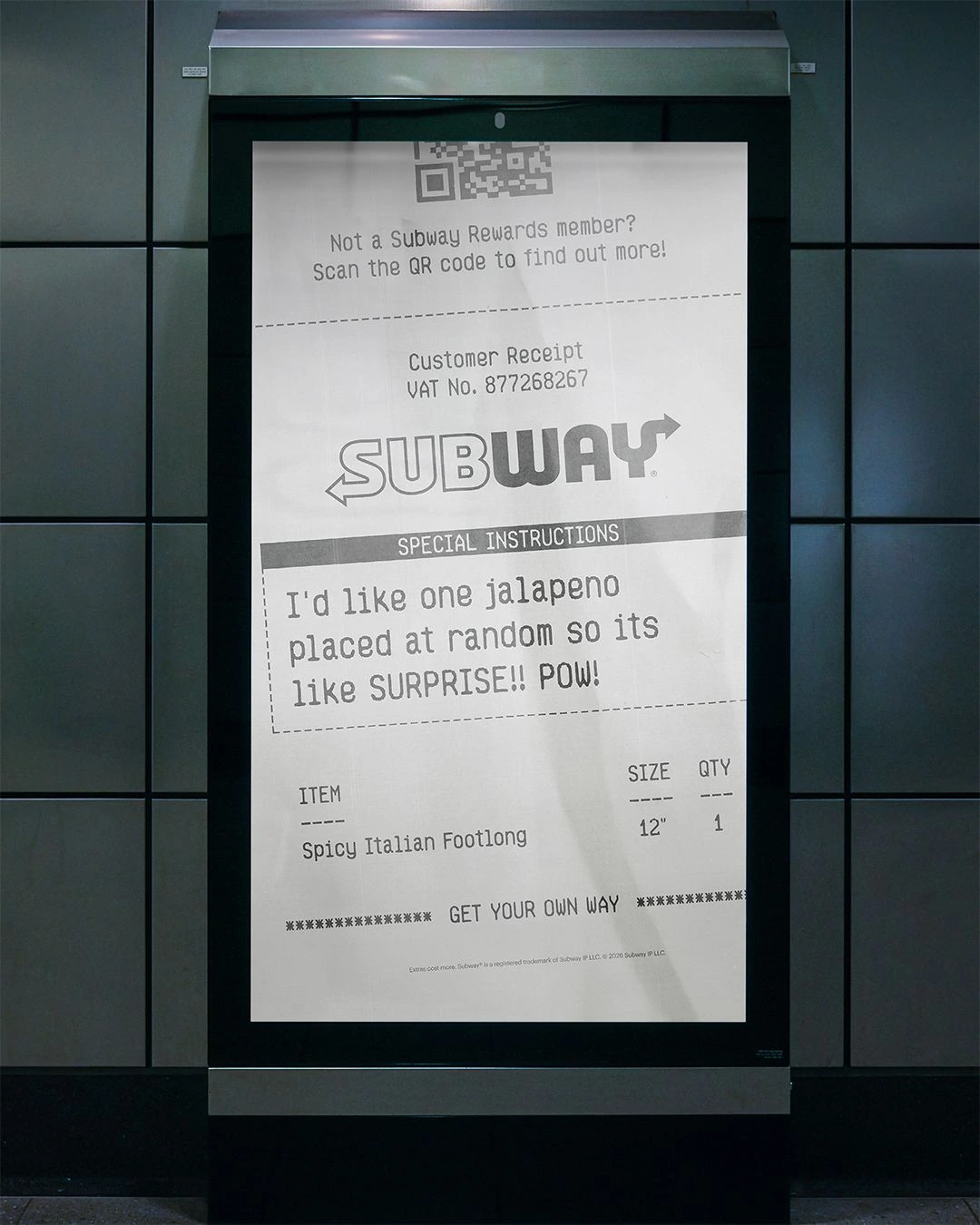 Subway receipt-style transit poster with a request for one randomly placed jalapeno on a Spicy Italian Footlong.