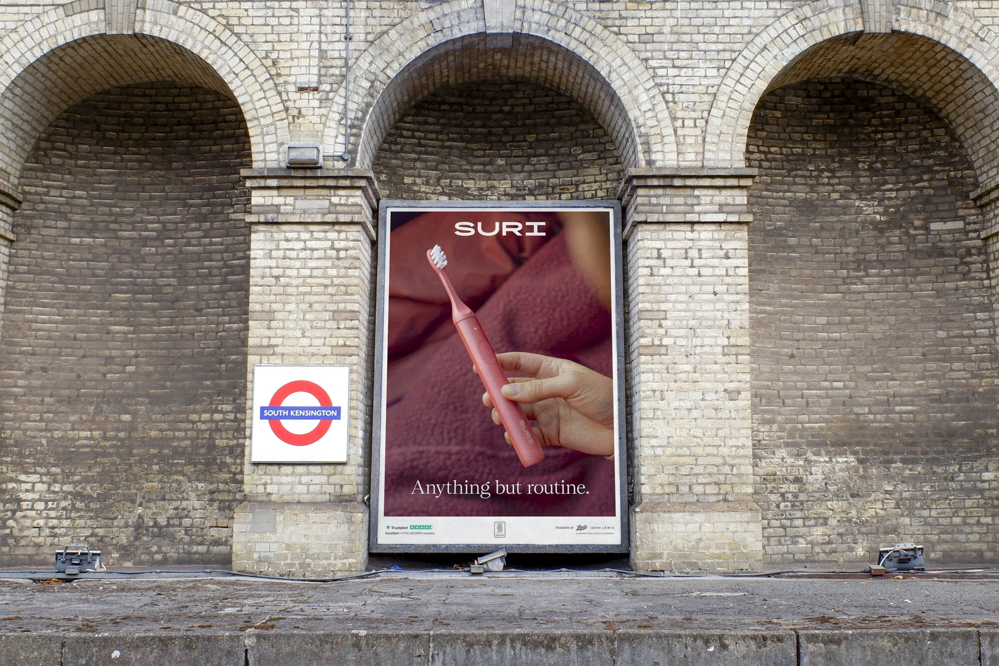 SURI Anything but routine poster at South Kensington station in London.