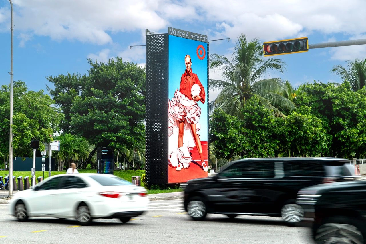 Target digital OOH campaign in Los Angeles featuring fashion-led red and white creative on a roadside display.