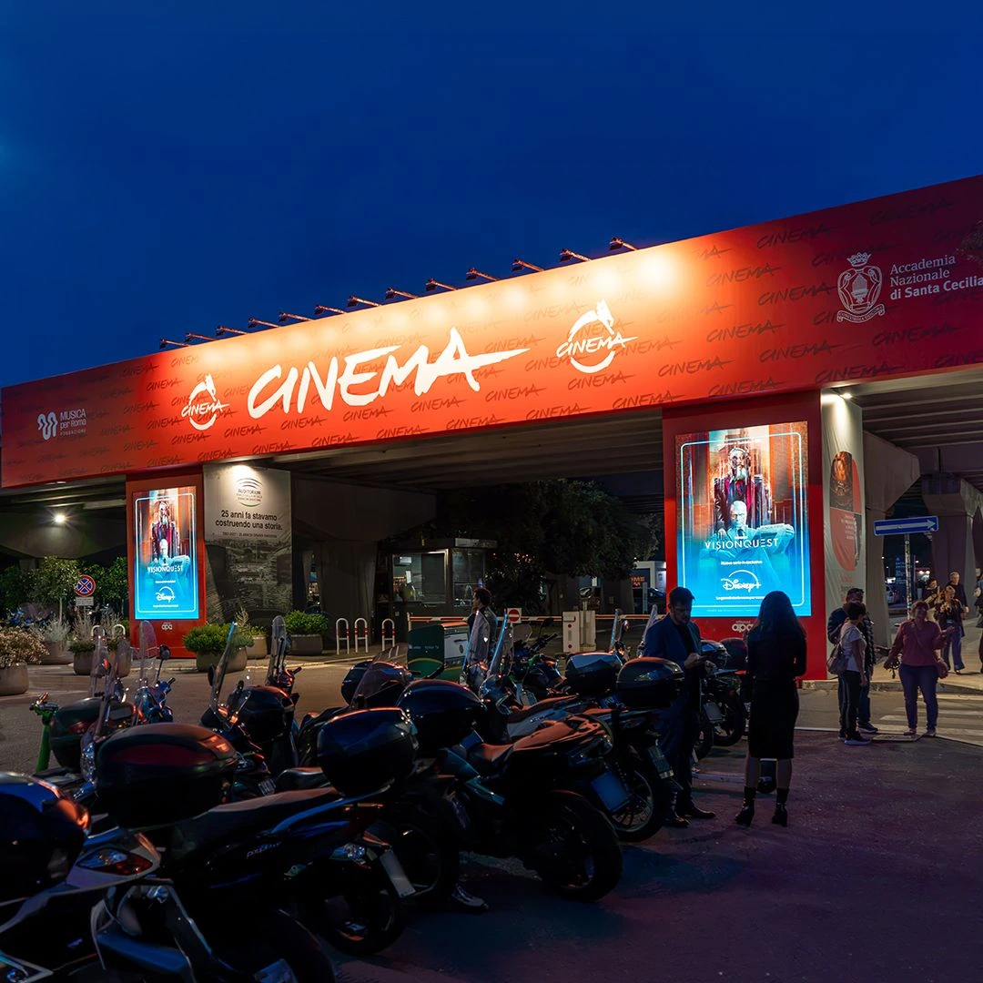 VisionQuest Disney+ digital posters at the entrance to a Cinema venue in Rome.