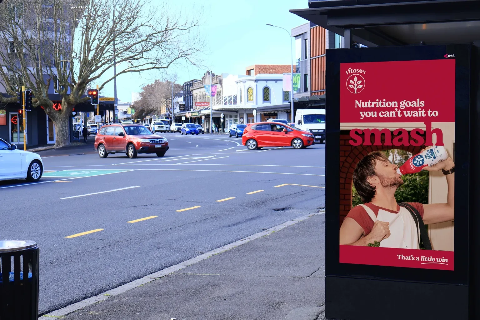 Vitasoy street furniture DOOH campaign in Auckland showing That’s a Little Win creative on an urban digital panel.