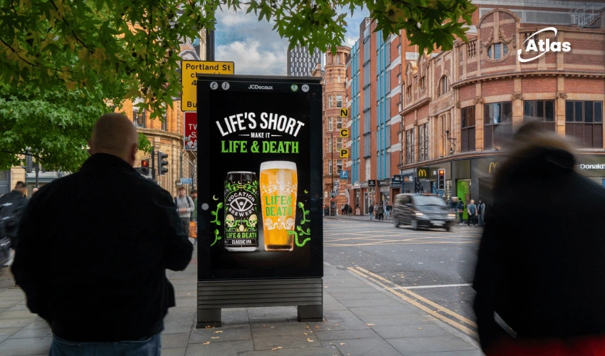 Vocation Brewery Life and Death IPA OOH campaign in Manchester featuring bold green typography, black backgrounds and premium digital street furniture