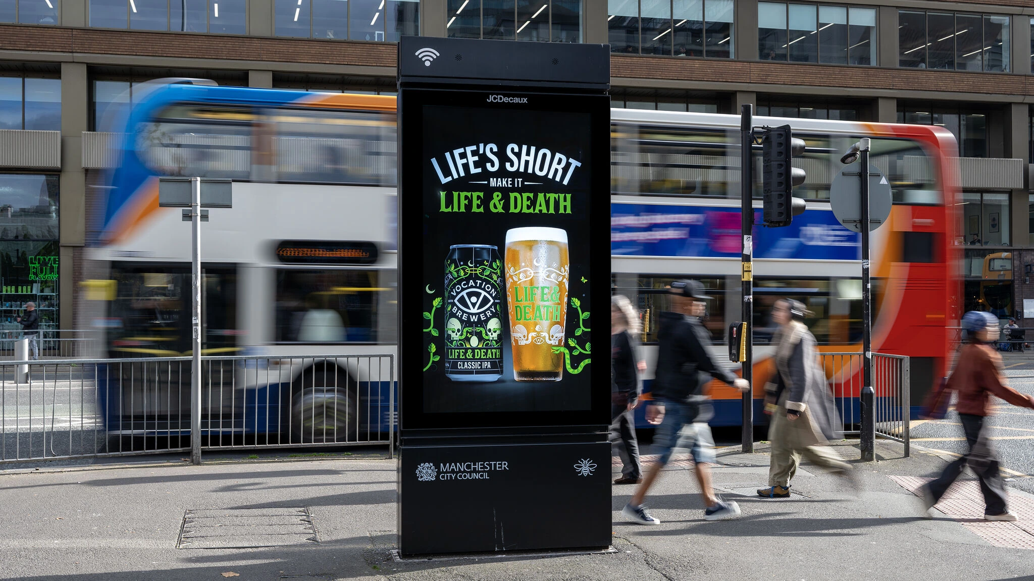 Street furniture OOH display featuring Vocation Brewery Life & Death Classic IPA in a central Manchester setting.
